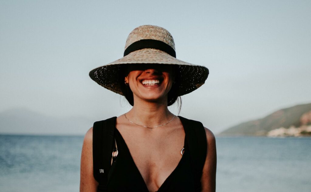 woman smiling at the beach